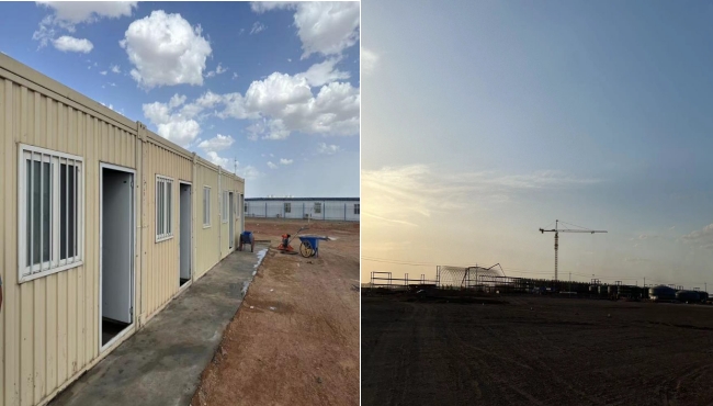 萬頃黃沙映壯志，樓閣巍巍矗風(fēng)沙